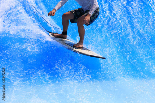 surfer rides the ocean wave © takadahirohito