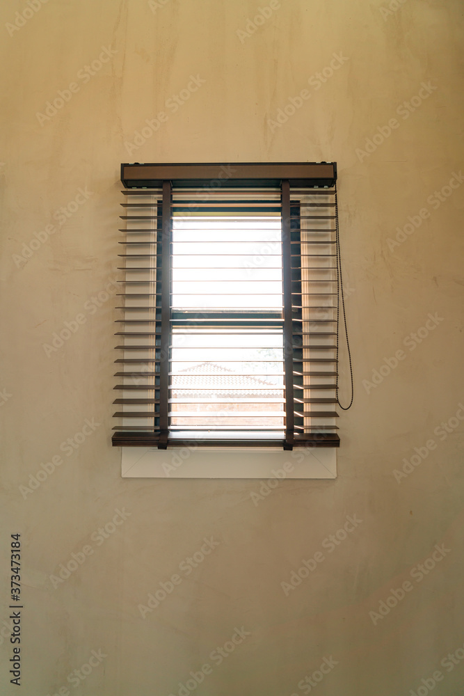 Fototapeta premium window on wall with sunlight