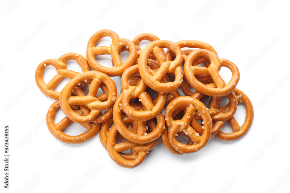 Fototapeta premium Delicious crispy pretzel crackers isolated on white, top view