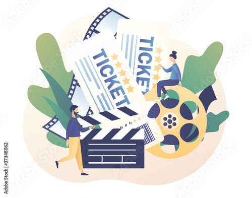 Movie tickets online sale. Online cinema. Tiny people buy tickets on the internet. Cinematography. Modern flat cartoon style. Vector illustration on white background