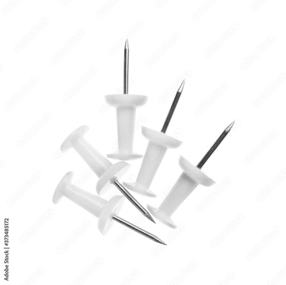 Colorful drawing pins isolated on white, top view. School stationery