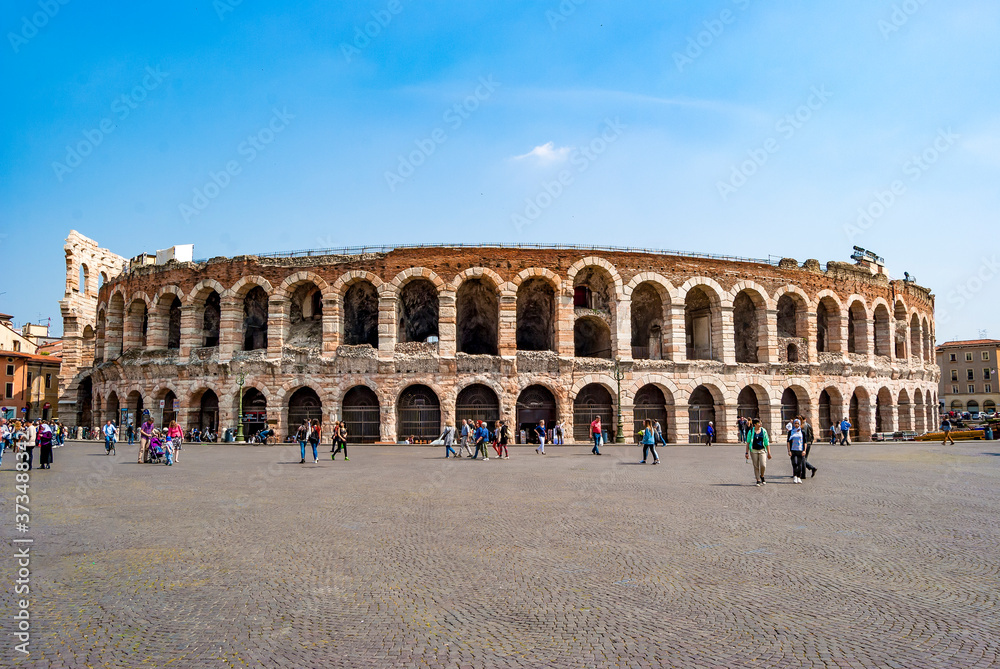 Exterior view of the Verona Arena, a Roman amphitheatre in Piazza Bra, in Verona, Italy. Built in the first century, today it's an open air large-scale opera theater.