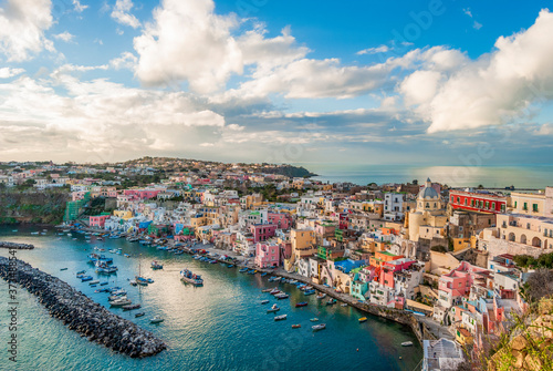 Fototapeta Naklejka Na Ścianę i Meble -  Scenic view of the harbor of Procida island, one of the Flegrean Islands off the coast of Naples in the region of Campania, Southern Italy.