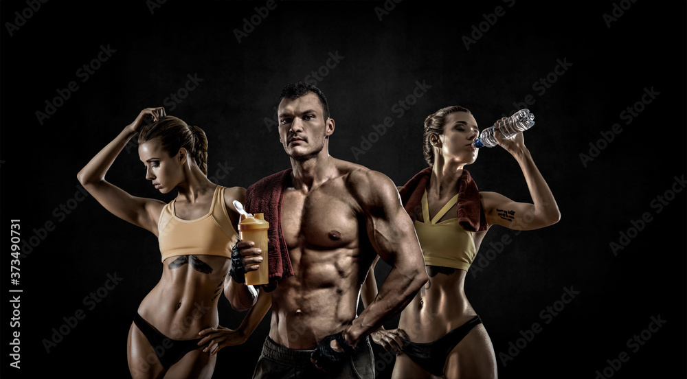 group of threesome man with woman bodybuilders