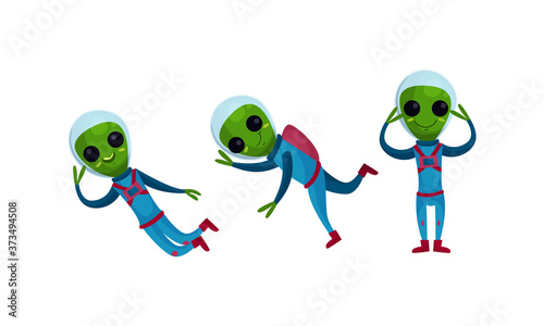 Green Alien Creatures in Spacesuit Standing and Waving Hand Vector Set