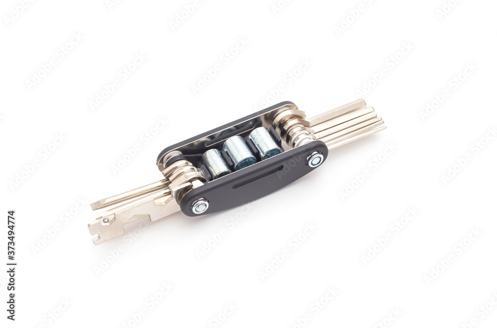 bike multifunctional tool on white background, isolate. Hexagon, screwdriver and socket concept in one tool, close-up bike multifunctional tool on white background, isolate. Hexagon, screwdriver and socket concept in one tool, close-up