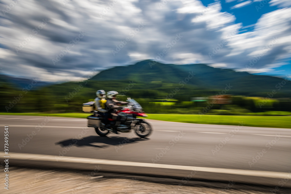 Tricycle Blurred motion Bikers on the road Tricycle Blurred motion Bikers on the road