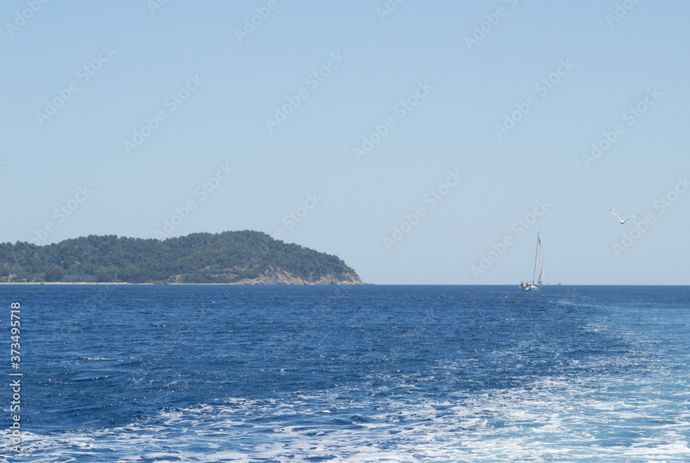 Sailing boat on the high seas in Greece 