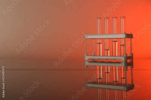 background with chemical flasks and tubes with reflection and copy space © Петр Смагин