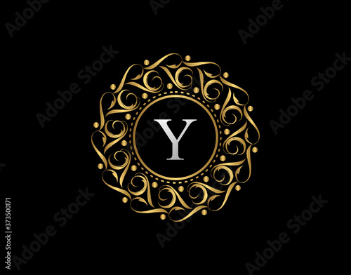 Gold Calligraphic Badge with Letter Y Design. Ornamental luxury golden logo design vector illustration.