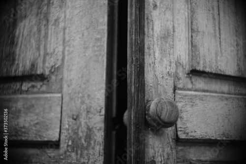 old wooden doors with round handle