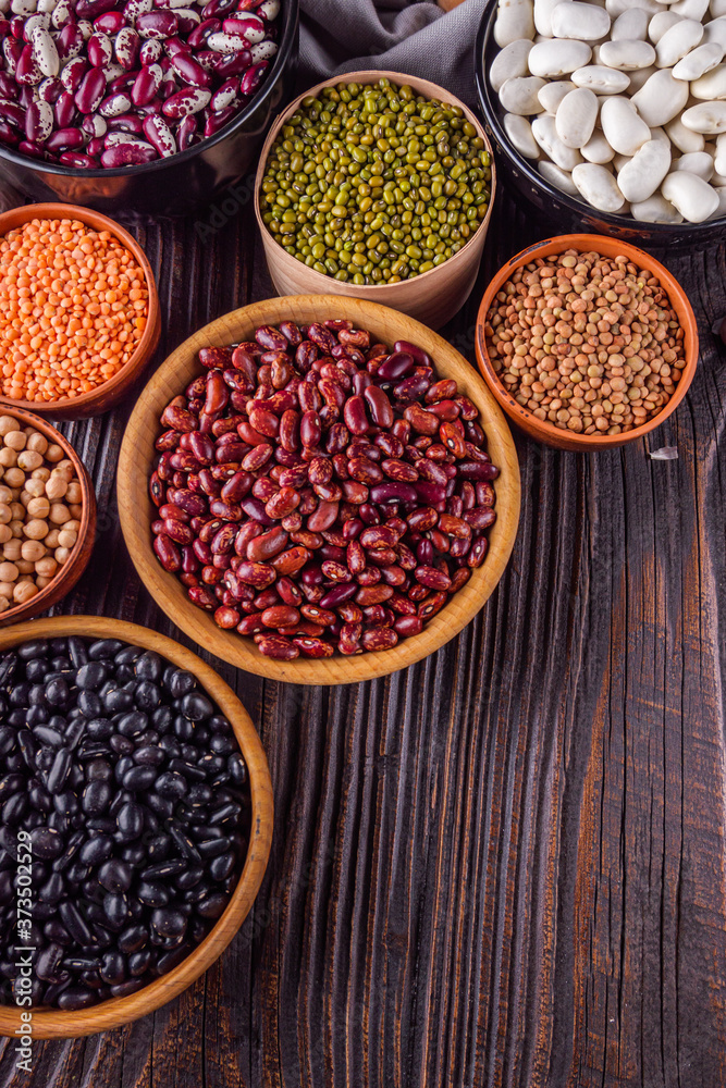 Fresh organic natural beans on wooden rustic background Fresh organic natural beans on wooden rustic background