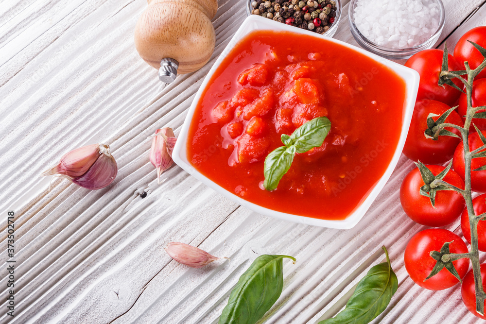 juicy canned tomatoes on wooden rustic background juicy canned tomatoes on wooden rustic background