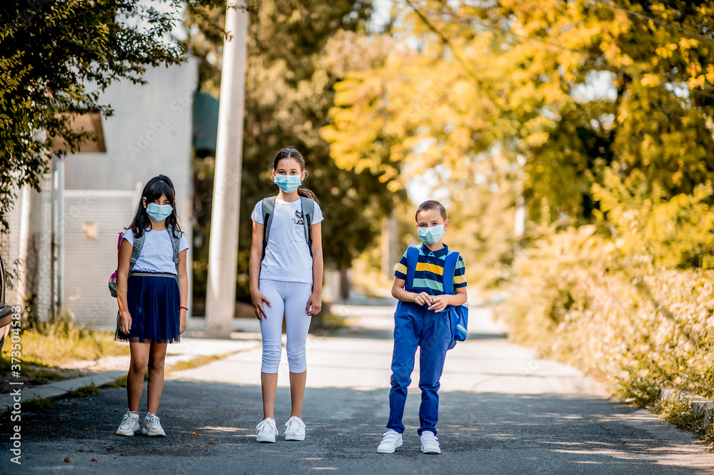 Children going back to school after epidemic, They are wearing a protective face mask