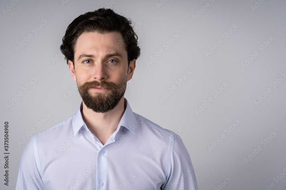 Cheerful young man, look at camera, close up. isolated on white background Cheerful young man, look at camera, close up. isolated on white background
