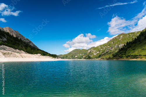 View of Fedaia lake at Fedaia pass in Italy
