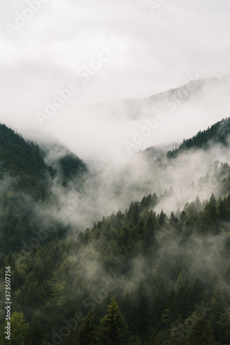 Clouds and fog cover the dolomites in Italy