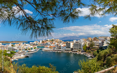 Obraz na płótnie Agios Nikolaos, Greece - August 9, 2020 - View of the bay of Agios Nikolaos with the famous port. w salonie