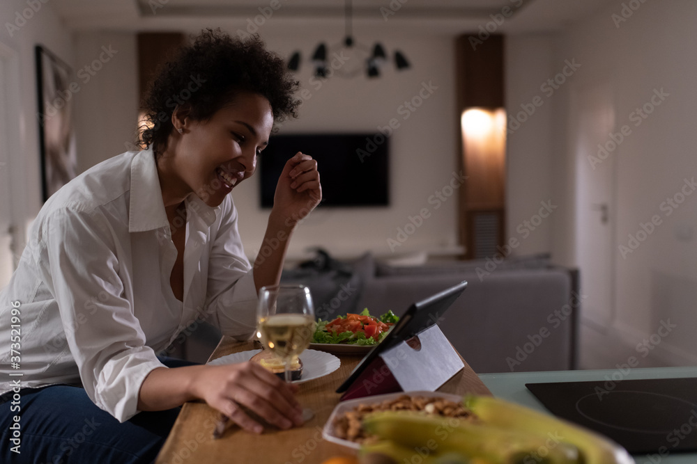 Happy African American lady speaking with boyfriend online Happy African American lady speaking with boyfriend online