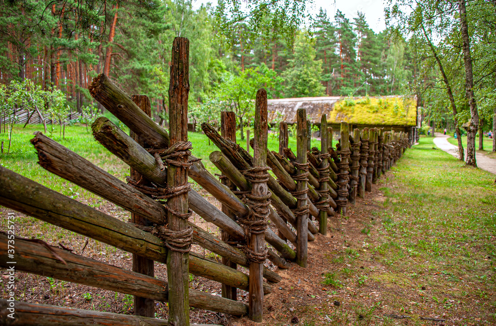 old wooden fence in a village near Riga, Latvia