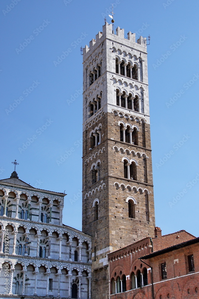 Tower, Duomo di Lucca, against the blue sky Tuscany, Italy