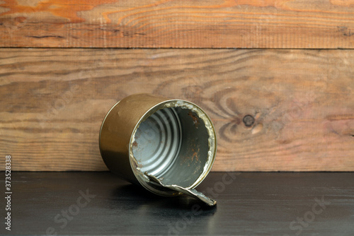 tin can on wooden background