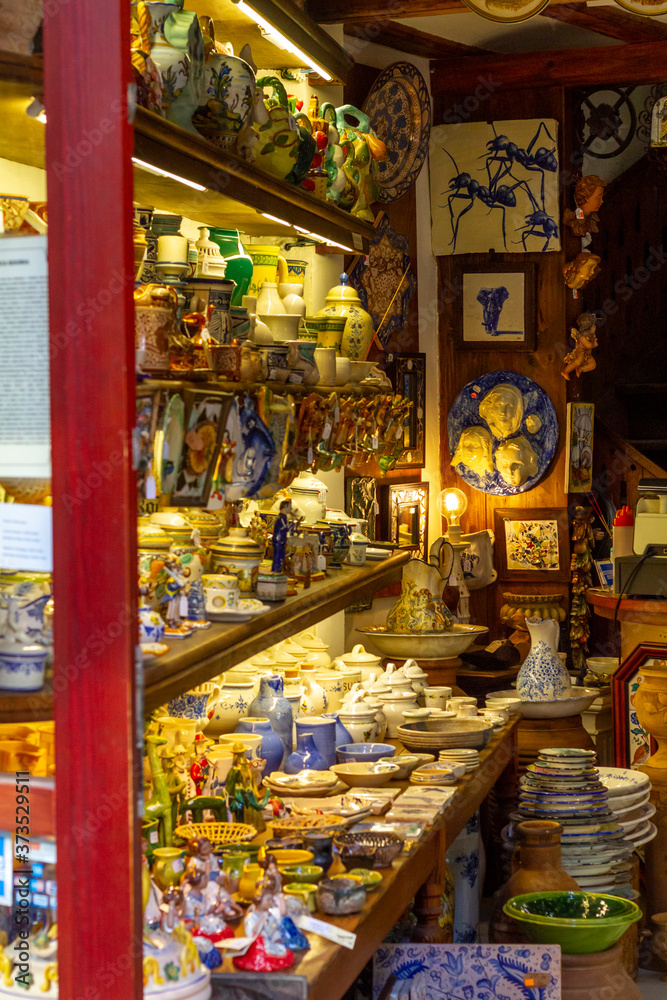 View from the street of the interior of a traditional ceramic shop in Valencia (Spain)