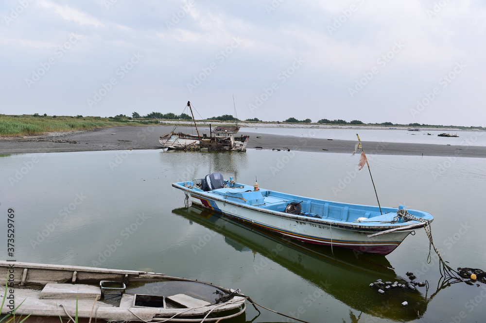 Scrapped Fishing boats at Haje Port closed by the Saemangeum seawall in Okseo-myeon, Gunsan, North Jeolla Province, South Korea on the evening of August 24, 2020. Scrapped Fishing boats at Haje Port closed by the Saemangeum seawall in Okseo-myeon, Gunsan, North Jeolla Province, South Korea on the evening of August 24, 2020.