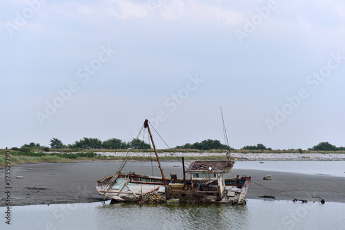 Scrapped Fishing boats at Haje Port closed by the Saemangeum seawall in Okseo-myeon, Gunsan, North Jeolla Province, South Korea on the evening of August 24, 2020.