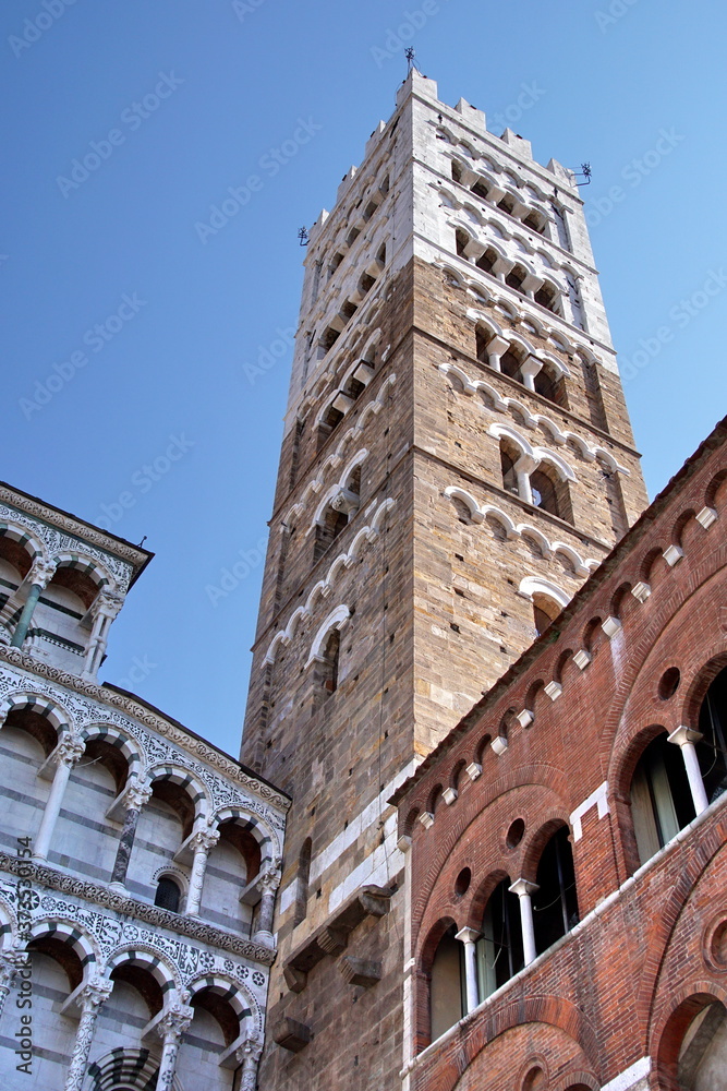 Tower, Duomo di Lucca, against the blue sky Tuscany, Italy