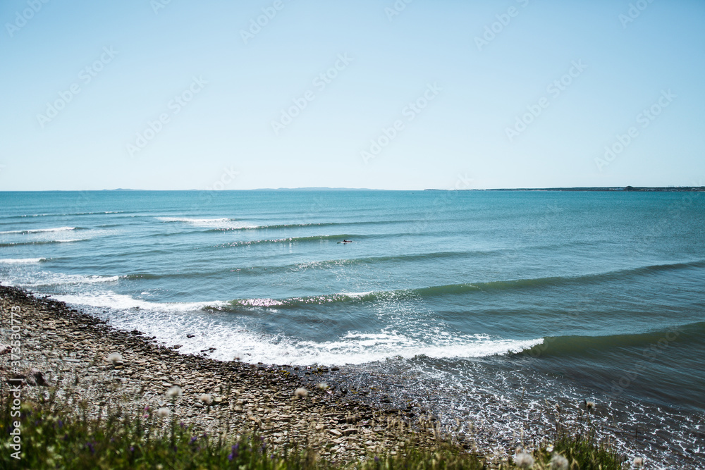 Surfing perfect waves at Iles de la Madeleine Quebec