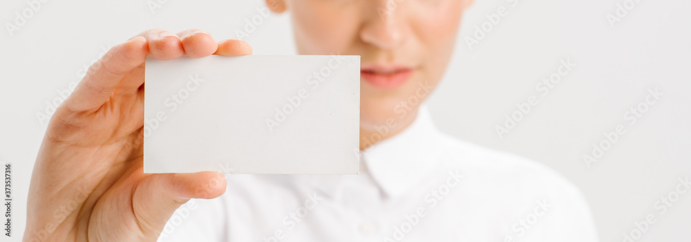 close-up portrait of a young businesswoman with Blank Business Card close-up portrait of a young businesswoman with Blank Business Card
