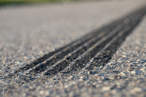 Tire footprints on asphalt