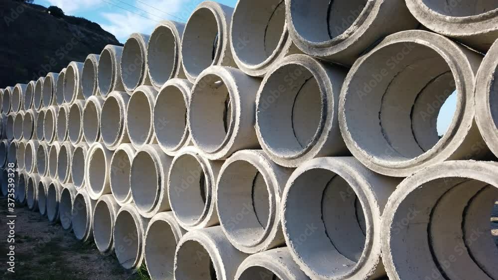 Building materials in packages, pallets stored in field at construction site Building materials in packages, pallets stored in field at construction site