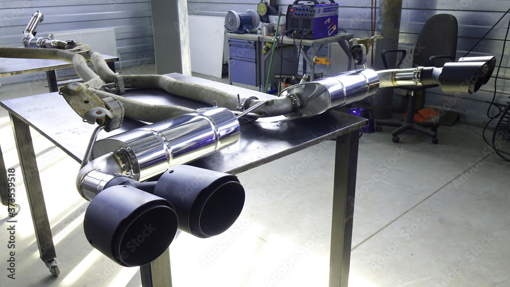 Obraz premium exhaust pipes for a performance car