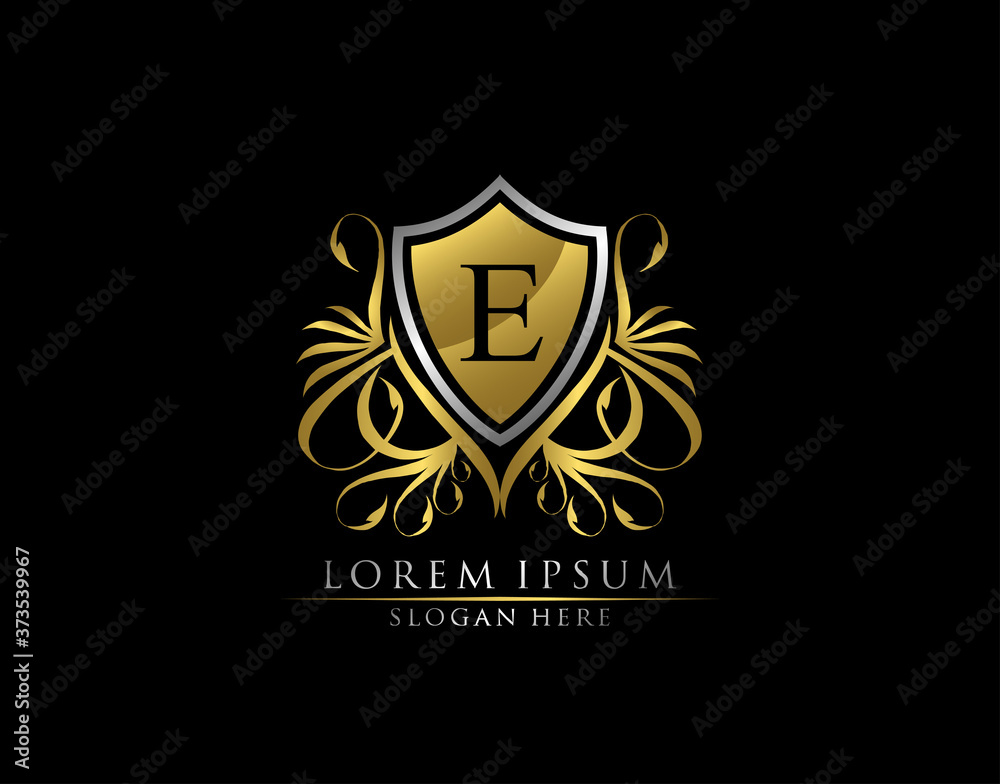 Gold Royal Shield E Letter Logo. Graceful Elegant gold shield icon design.