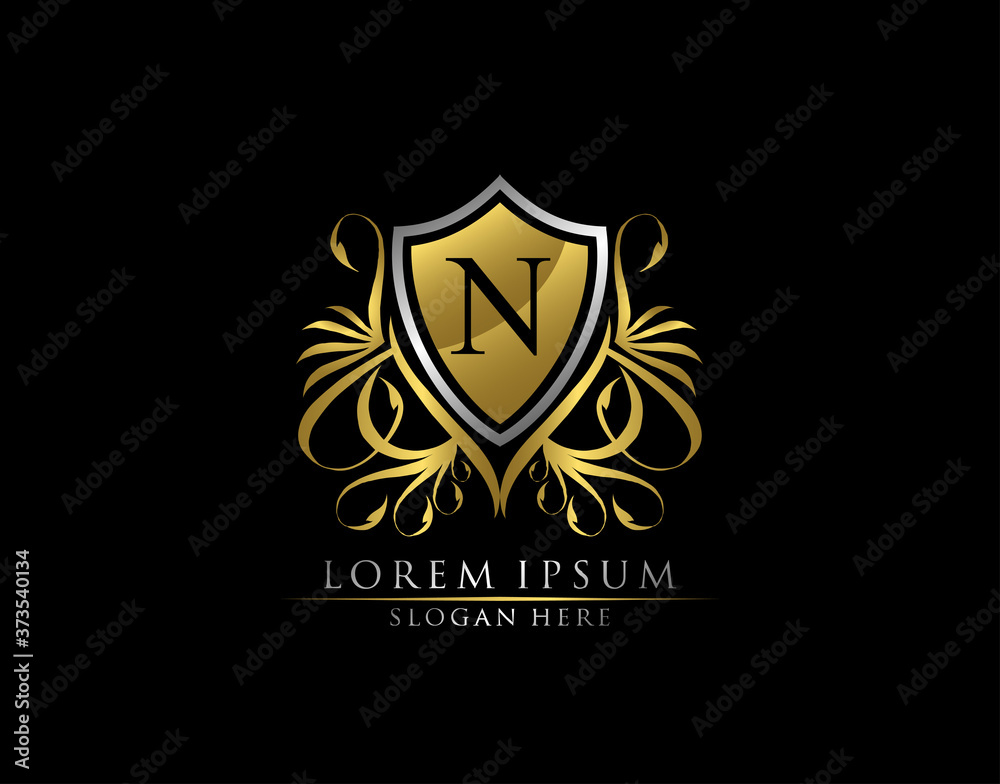 Gold Royal Shield N Letter Logo. Graceful Elegant gold shield icon design. Gold Royal Shield N Letter Logo. Graceful Elegant gold shield icon design.