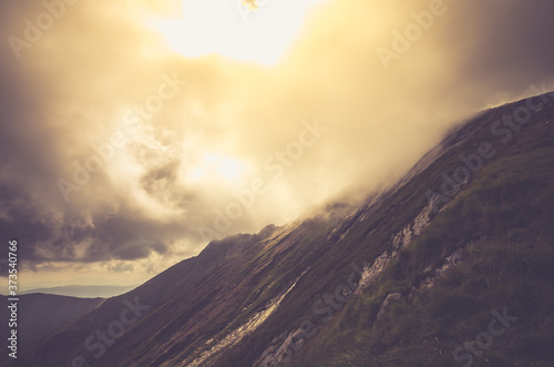 Misty Fagaras Mountains, Romania. Mist over the alps of Transylvania. photo