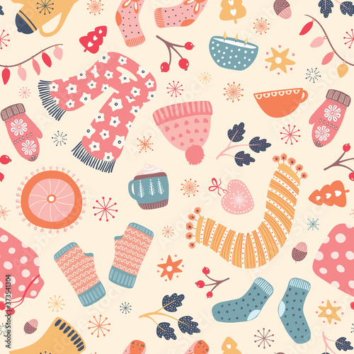 Autumn Hygge pattern design . Vector winter and Fall seamless repeat of scarfs, gloves, mugs, candles, foliage, socks and other warm and cosy elements.