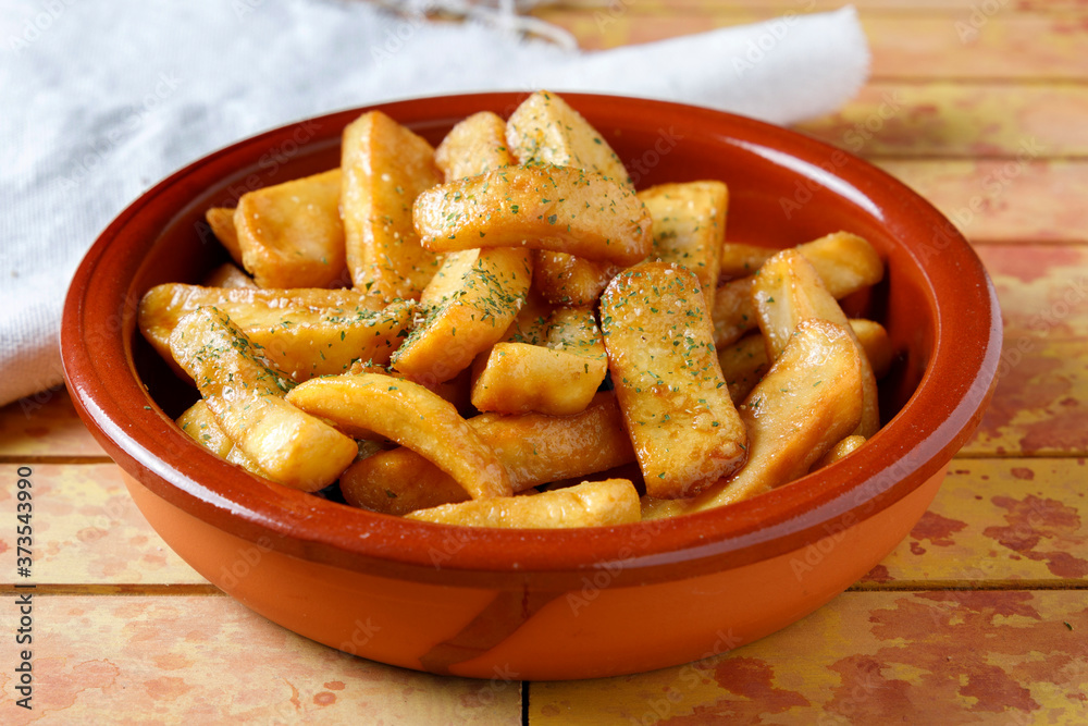 fried potatoes with salt, parsley and rosemary fried potatoes with salt, parsley and rosemary