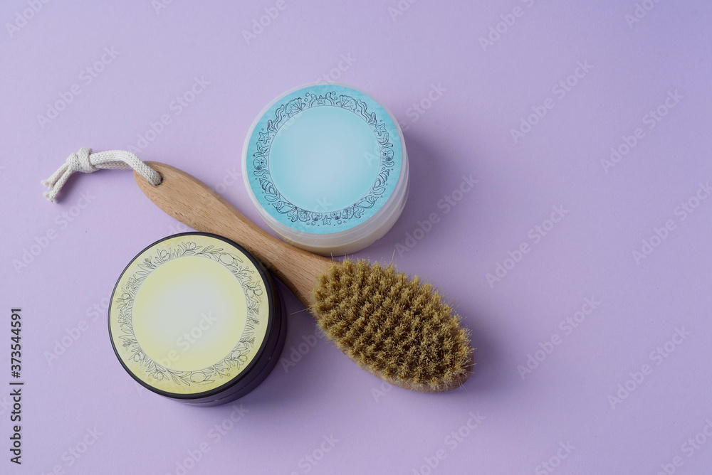 Obraz premium a jar of beldi and a crusher drainage brush for body massage
