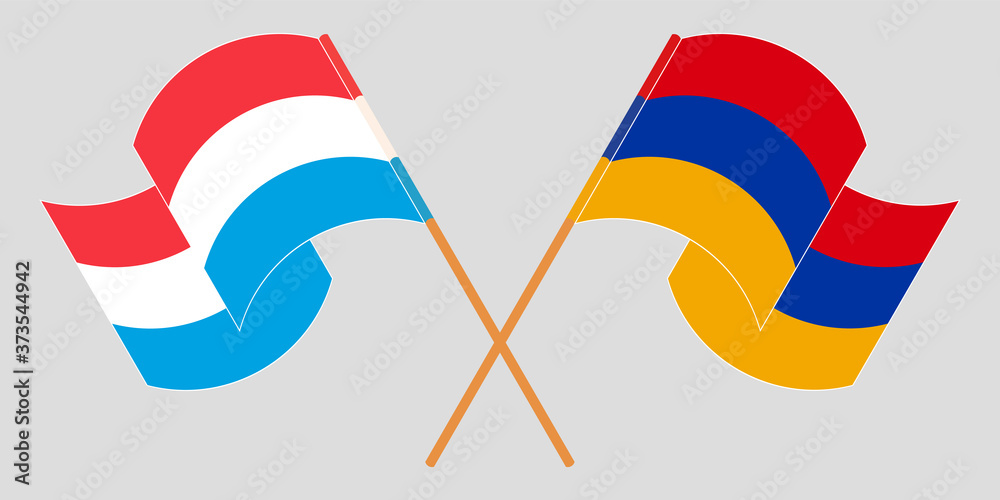 Crossed and waving flags of Luxembourg and Armenia