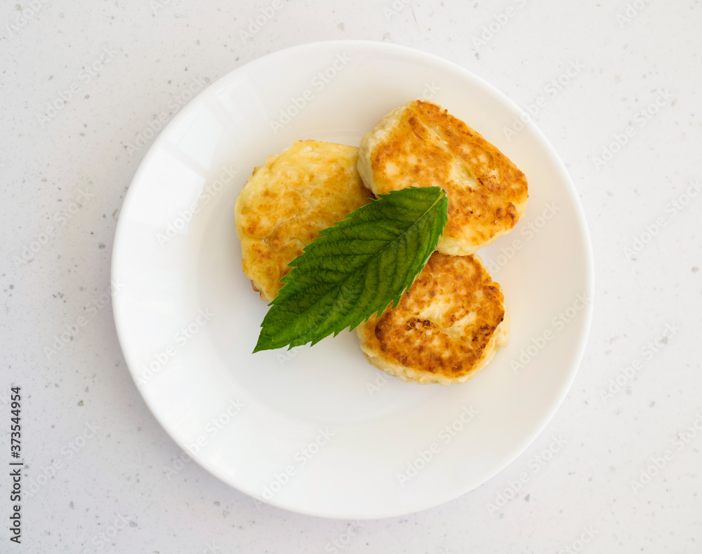 curd pancake with mint leaves for flavor. curd pancake with mint leaves for flavor.