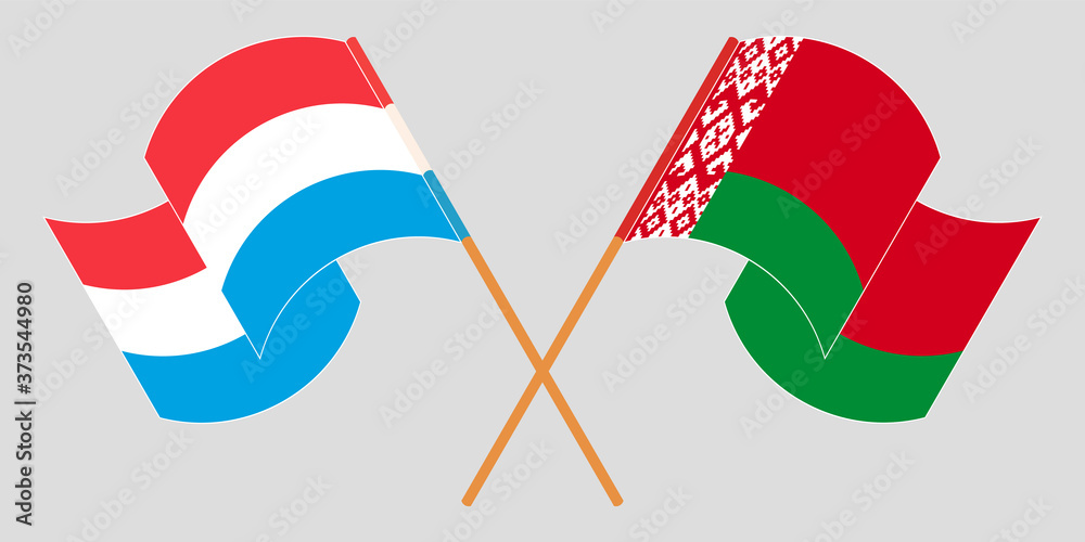 Crossed and waving flags of Luxembourg and Belarus Crossed and waving flags of Luxembourg and Belarus