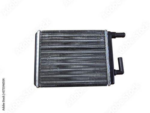 Heater core of the car on an isolated white background. Spare parts. photo