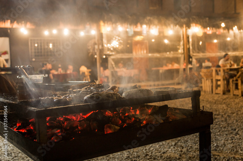 Grill hamburguers and meat  in a big 
Barbecue photo