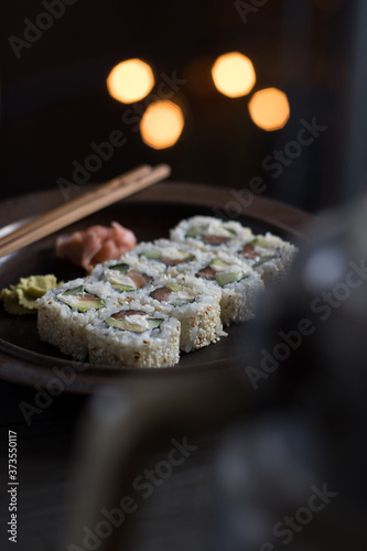 sushi on a brown plate photo