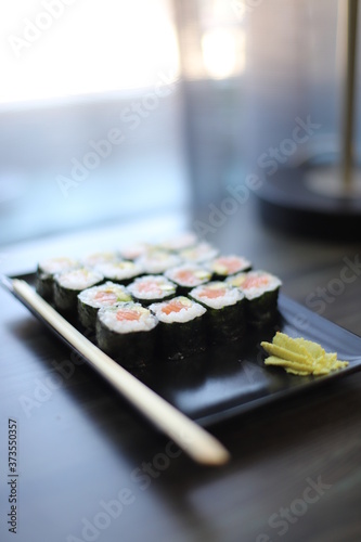 Sushi on a black plate photo