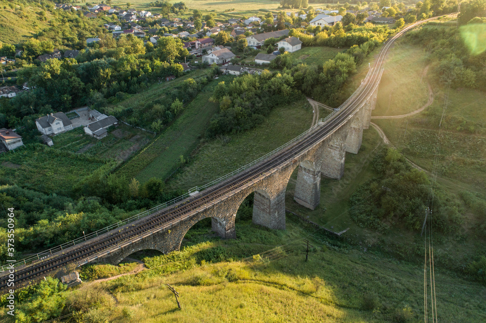 Fototapeta premium Aerial view of an old railway viaduct near Terebovlya village in Ternopil region, Ukraine.