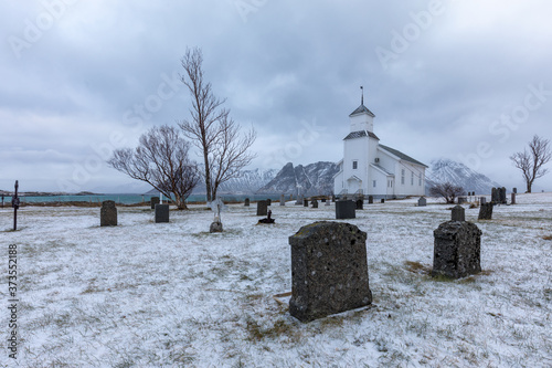 Gimsoy church and the cemetery. Lofoten Islands, Norway photo